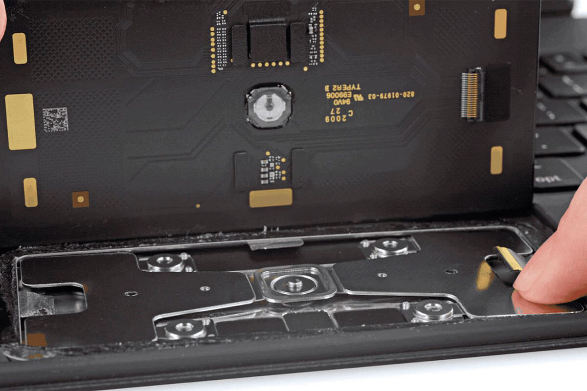 iFixit dotarłeś do Trekpada w Magic Keyboard